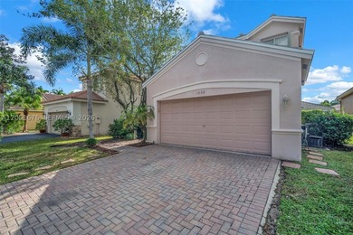 Nestled within the gated community of Savanna, this expansive - photo 2