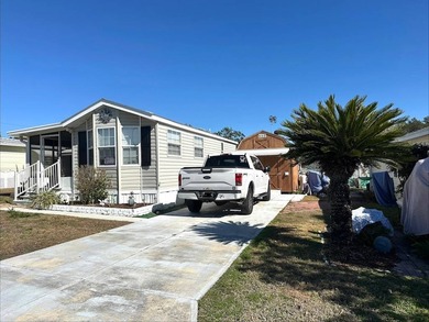 THIS BRIGHT AND UPDATED 2018 PARK MODEL OFFERS A COMFORTABLE AND - photo 3