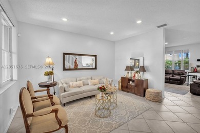 Nestled within the gated community of Savanna, this expansive - photo 5