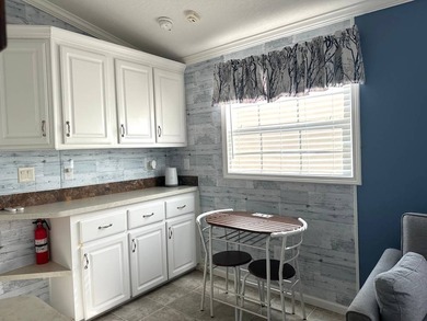 THIS BRIGHT AND UPDATED 2018 PARK MODEL OFFERS A COMFORTABLE AND - photo 6