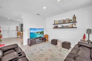 Nestled within the gated community of Savanna, this expansive - photo 8