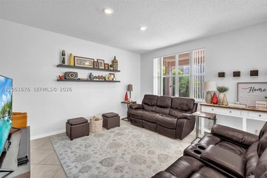 Nestled within the gated community of Savanna, this expansive - photo 9