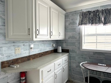 THIS BRIGHT AND UPDATED 2018 PARK MODEL OFFERS A COMFORTABLE AND - photo 10