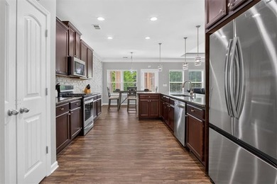 Welcome home to this beautifully maintained true ranch-style - photo 16