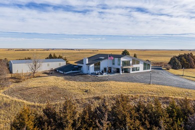 Located less than one mile from Imperial, Nebraska, this 900+/- - photo 2