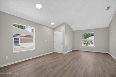 This stunning 4 bedroom, 2 bath single-story home in - photo 3