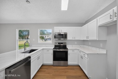 This stunning 4 bedroom, 2 bath single-story home in - photo 6