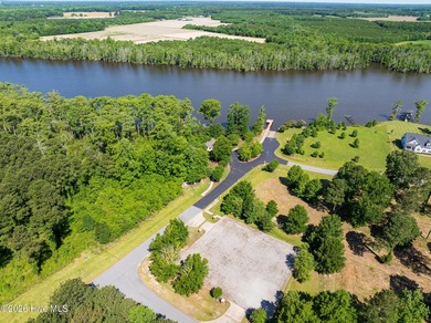 Set within the gated RiverSound community, this waterfront lot - photo 2