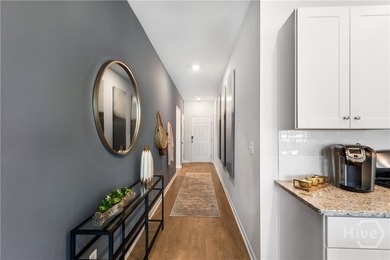 This single-story Hartford home design features an open space - photo 11