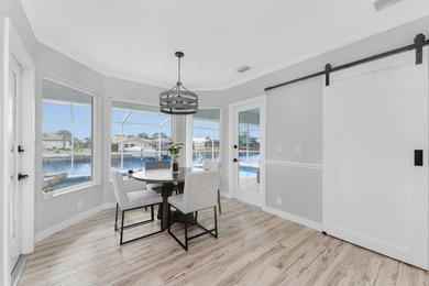Experience refined waterfront living in this extensively - photo 11