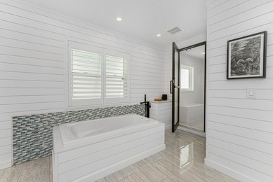 Experience refined waterfront living in this extensively - photo 16
