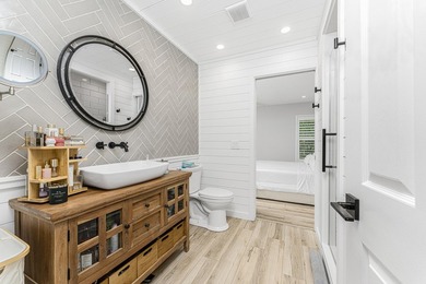 Experience refined waterfront living in this extensively - photo 22