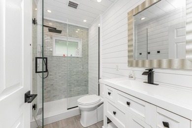 Experience refined waterfront living in this extensively - photo 26