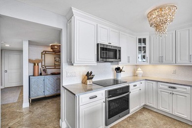 Escape to paradise in this exquisite updated penthouse unit at - photo 15