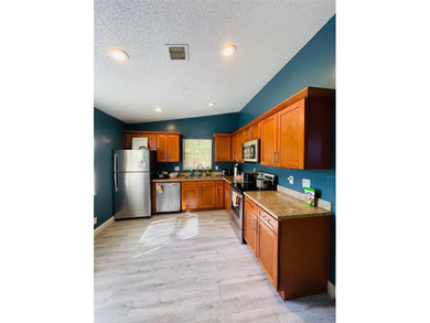 Beautiful and well-maintained home located in a desirable gated - photo 4