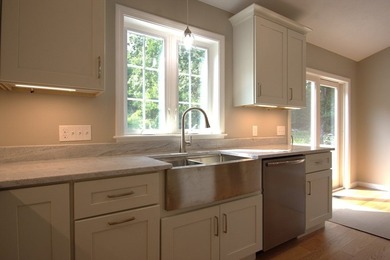 Enjoy the privacy of 1.5 acres in a country setting but offering - photo 7