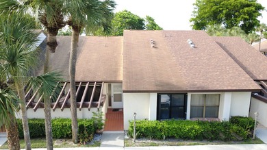 Move right into this beautifully maintained 55+ villa featuring - photo 1