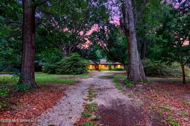Situated on approximately 3.5 private acres in Long Beach, this - photo 3