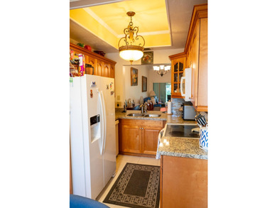 Move right into this beautifully maintained 55+ villa featuring - photo 3