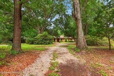 Situated on approximately 3.5 private acres in Long Beach, this - photo 6