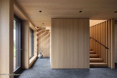 Overlooking the open valley with framed views of Sleeping Indian