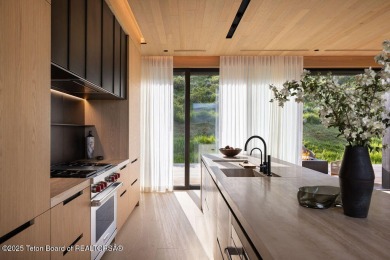 Overlooking the open valley with framed views of Sleeping Indian