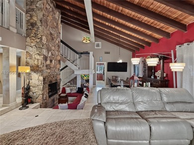 Tucked behind a private, palm-lined entrance in sought-after - photo 7