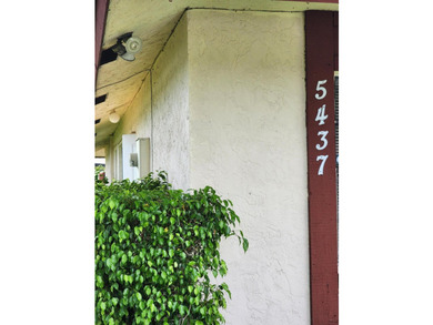 Welcome to this charming 3-bedroom, 2-bathroom townhouse located - photo 1