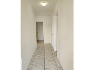 Welcome to this charming 3-bedroom, 2-bathroom townhouse located - photo 3