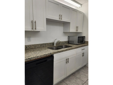 Welcome to this charming 3-bedroom, 2-bathroom townhouse located - photo 10
