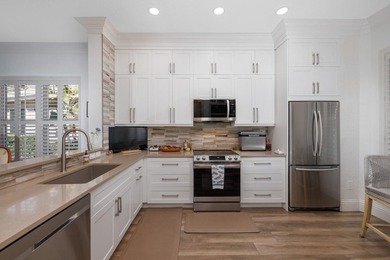 This is a TOTALLY UPDATED absolutely lovely VILLA in Monarch - photo 14