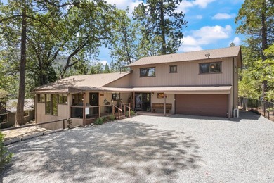 Opportunity awaits! This classic Bass Lake cabin offers the - photo 1