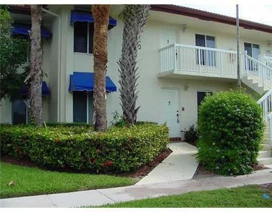 Located on a private canal lot,this neutral & clean 2/2 ground - photo 1