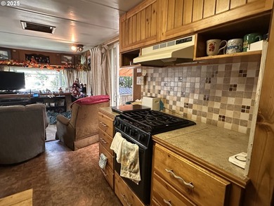 This Coast Village property has a one-bedroom main house with a - photo 20