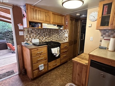 This Coast Village property has a one-bedroom main house with a - photo 22
