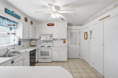 Discover the perfect beach retreat just steps from the - photo 41