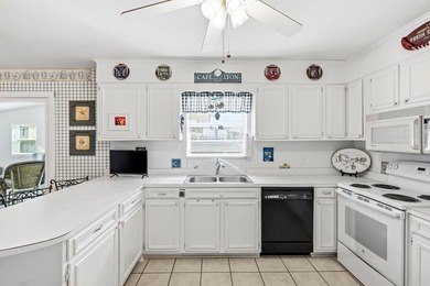 Discover the perfect beach retreat just steps from the - photo 43