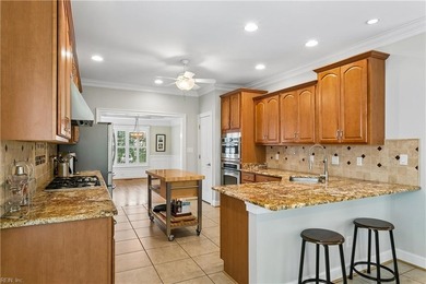 Nestled on a level one-acre lot in the prestigious Island at - photo 12