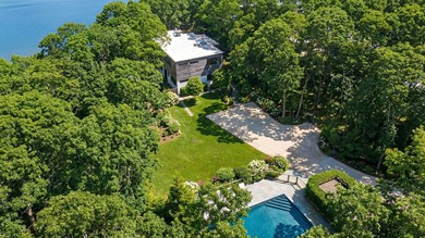 In the private Lion Head waterfront community, this chic - photo 3