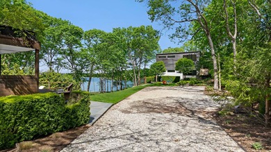 In the private Lion Head waterfront community, this chic - photo 4
