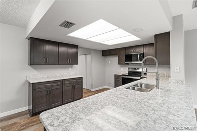 This beautifully remodeled home is right in the HEART of golf - photo 30