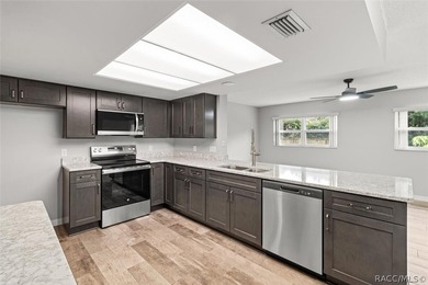 This beautifully remodeled home is right in the HEART of golf - photo 31