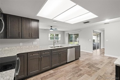 This beautifully remodeled home is right in the HEART of golf - photo 32