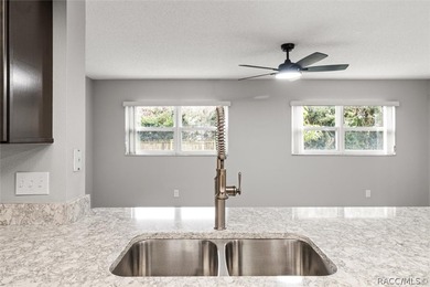 This beautifully remodeled home is right in the HEART of golf - photo 34