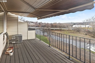 Welcome to easy riverfront living! This well-maintained - photo 25