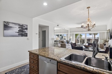 Experience coastal living at its finest with this gulf-front - photo 11