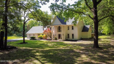 Nestled on a stunning 3.7-acre treed lot complete with a private - photo 2