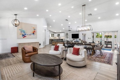 Stunning, fully renovated 4 BD, 2.5 BA residence situated on an - photo 2