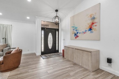 Stunning, fully renovated 4 BD, 2.5 BA residence situated on an - photo 3