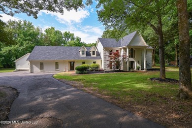 Nestled on a stunning 3.7-acre treed lot complete with a private - photo 4